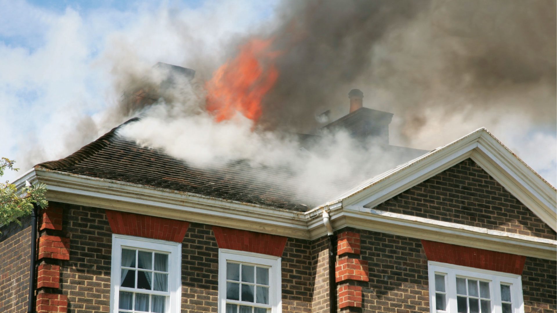 house with fire on the roof