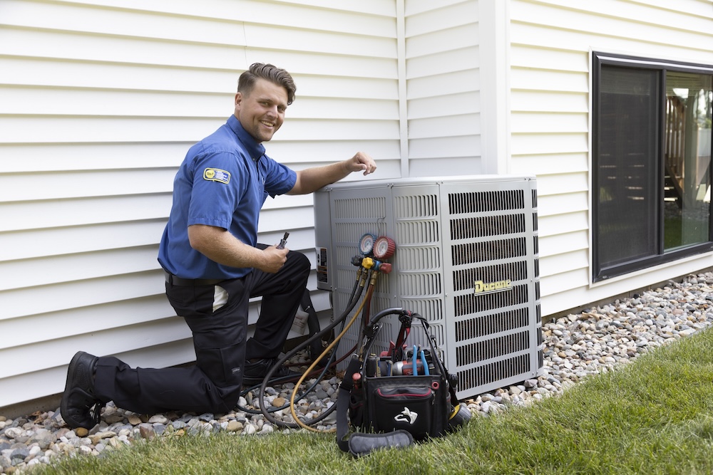 employee working on equipment outside