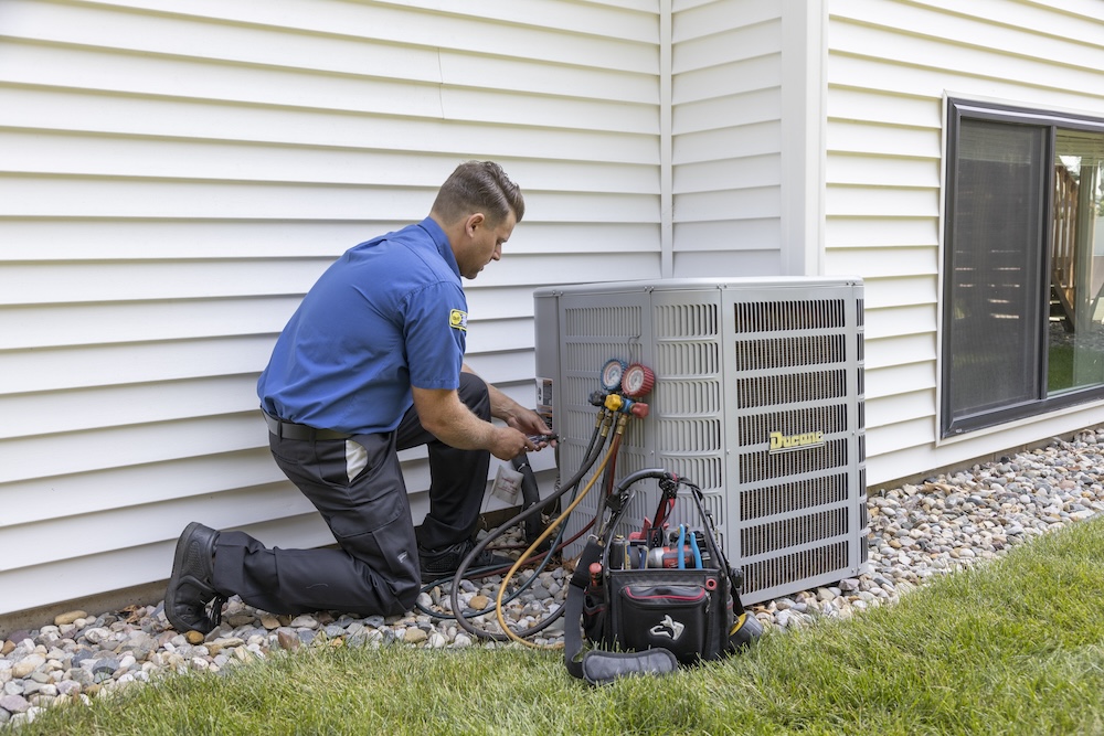 employee working on equipment outside