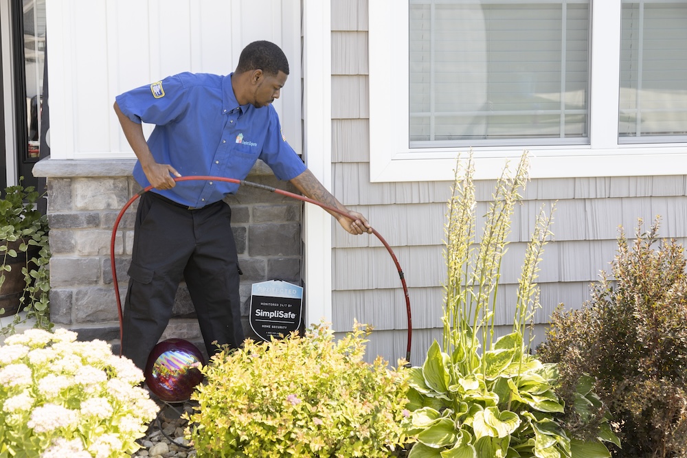 employee working on equipment outside